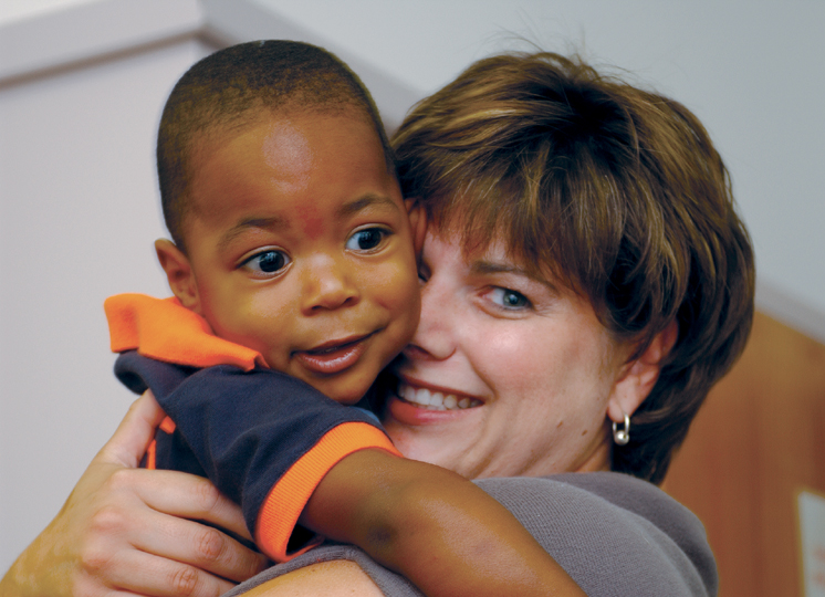 lady hugging a child