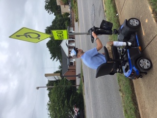 David Taylor Jr. With Accessible Crossing Sign