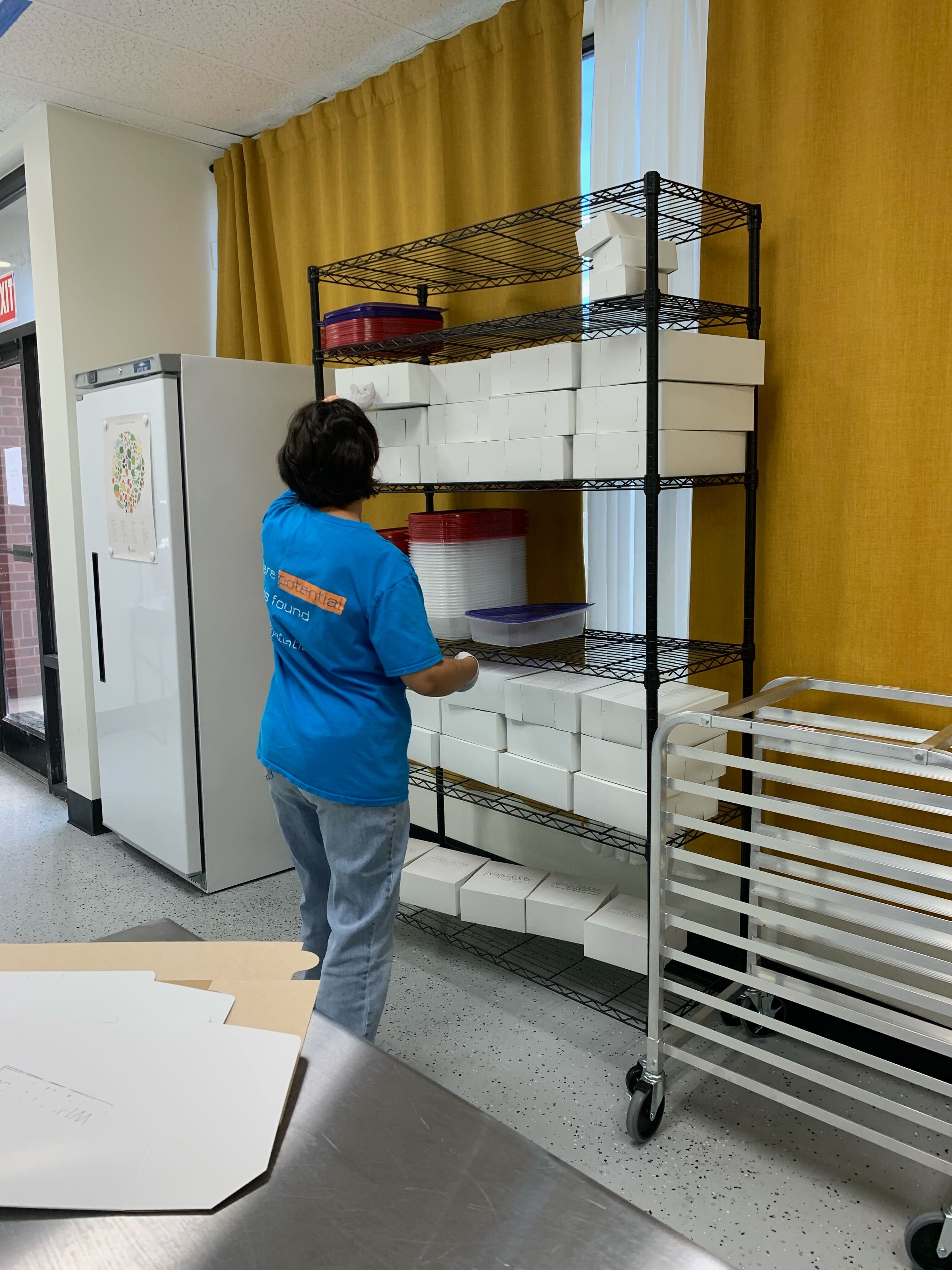 Maria stacking boxes